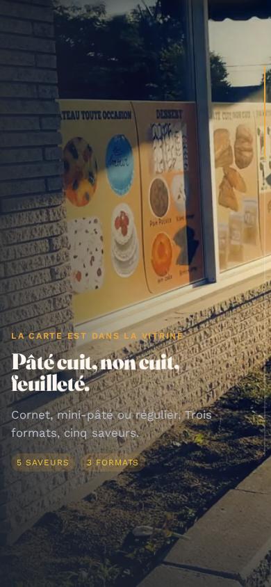 Section du menu de Dgioune Bouffe sur téléphone, sur une photo des affiches en vitrine.